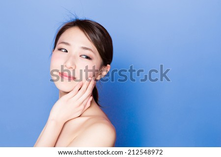 attractive asian woman skincare image on blue background