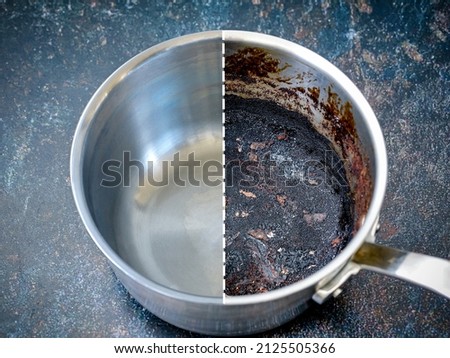 Compare burnt pan before and after cleaning the unclean able stained pot from burnt cooking. The dirty stainless steel pan with the clean pan clean shiny bright like new. Royalty-Free Stock Photo #2125505366