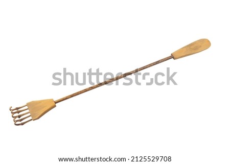 bamboo back scratcher is isolated on a white background. Royalty-Free Stock Photo #2125529708