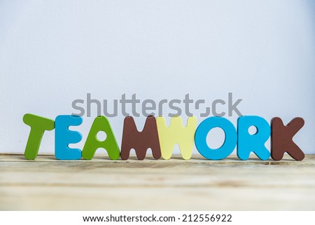 Colorful wooden word Teamwork with white background