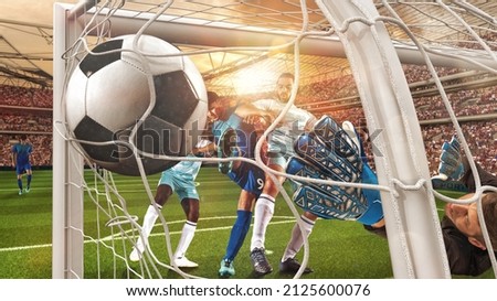 Soccer action with the striker who scores a goal at the corner of the goalpost Royalty-Free Stock Photo #2125600076