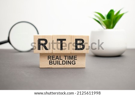 rtb word made with wood building blocks