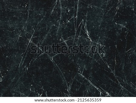 White scratches and dust on black background. Vintage scratched grunge plastic broken screen texture. Scratched glass surface wallpaper. Space for text Royalty-Free Stock Photo #2125635359