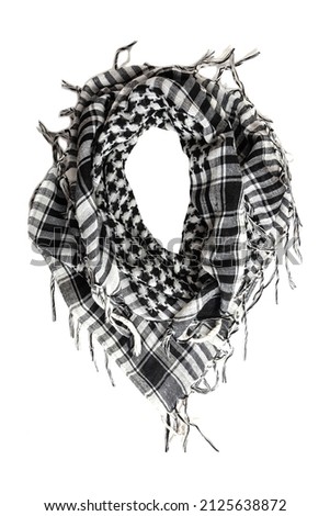 Traditional tissue black and white arabic man's head scarf Shemagh (Keffiyeh). Saudi men's national headdress Ghutrah. Close up textile background. Royalty-Free Stock Photo #2125638872