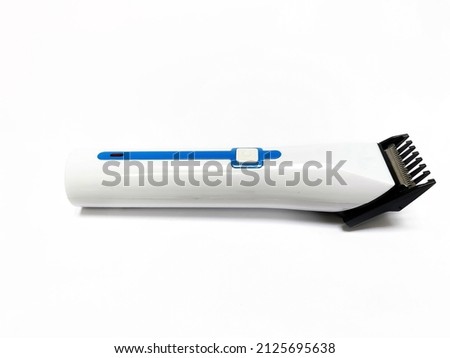 Electronic hair clipper isolated on white background Royalty-Free Stock Photo #2125695638