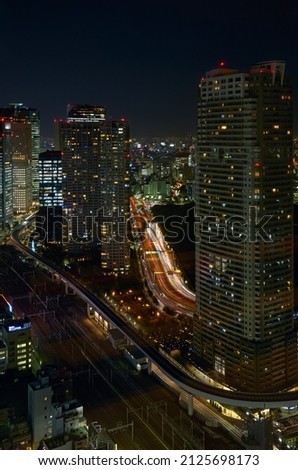 Skyscrapers of Shinbashi along Kaigan dori motorway at night. Tokyo. Japan