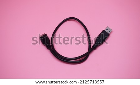 hard disk data cable on a pink background