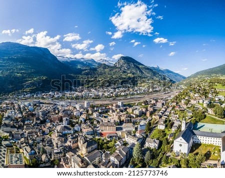 Aerial panorama image of the Swiss alpine town Brig in Canton Valais. Royalty-Free Stock Photo #2125773746