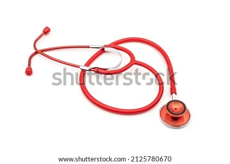 red stethoscope on isolated white background with copyspace