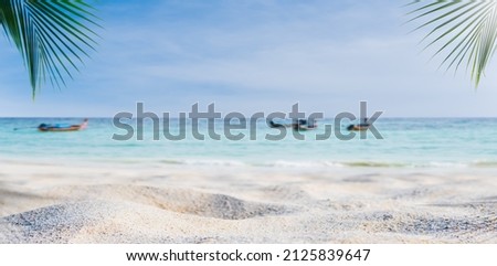 Sand beach seaside vacation on daylight with traditional boats on sea on blue sky background and free space for editing display product or text promote your projects tourism in summer season   Royalty-Free Stock Photo #2125839647