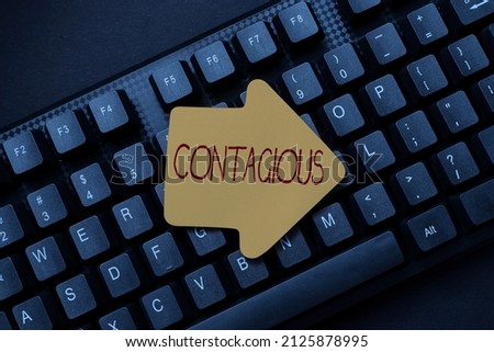 Sign displaying Contagious. Word Written on transmissible by direct or indirect contact with infected person Typing New Edition Of Informational Ebook, Creating Fresh Website Content Royalty-Free Stock Photo #2125878995