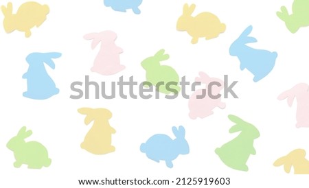 Multicolored rabbits easter background. Substrate for the text for Easter. Copyspace for text.