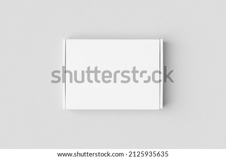 White cardboard postal, mailing box mockup. Royalty-Free Stock Photo #2125935635