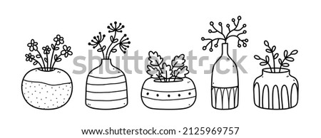 Set of cute flowers and twigs in ceramic vases and pots isolated on white background. Vector hand-drawn illustration in doodle style. Perfect for cards, decorations, logo. Royalty-Free Stock Photo #2125969757