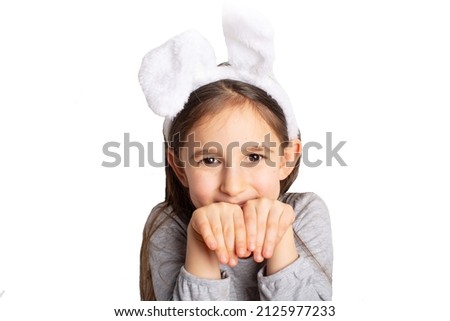 little girl in rabbit ears isolated on white background. Easter
