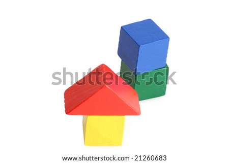 Wooden toy bricks isolated on white background