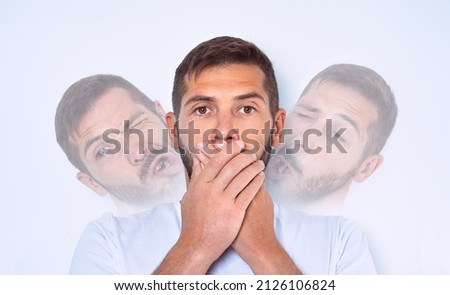 Man with Tourette syndrome, TS or nervous system problem. Man making tics, sudden twitches, movements, or sounds Royalty-Free Stock Photo #2126106824