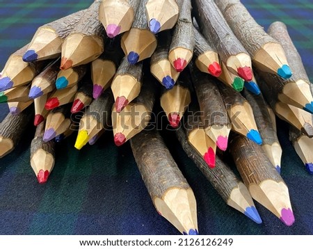 Many multicolored pencils. Colour pencils. Art and education background. Abstract background from color pencils. Crayons close up.