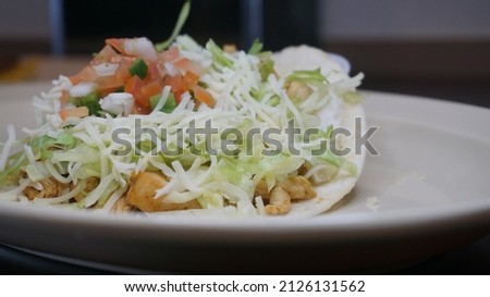 chicken tacos some soft tortillas that have a very interesting filling because they are made with chicken bell pepper cilantro and more ingredients white sauce tomato lettuce tomato delicious mexican 