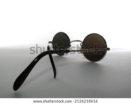 Photo of cool sunglasses as a symbol of youth, lifestyle and fashion