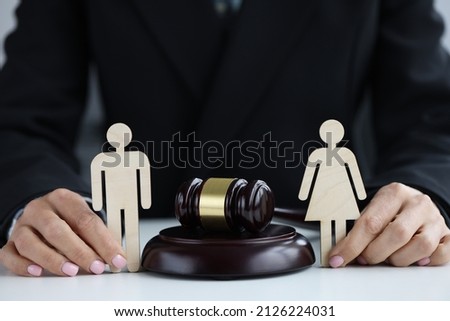 Family divorce and division of property and payment of alimony. Judgment in divorce concept Royalty-Free Stock Photo #2126224031