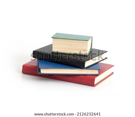Stack of red, black, blue and green on a white background
