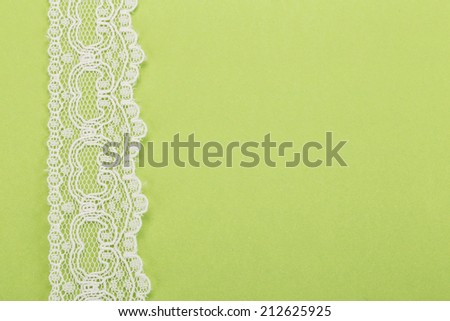 border by lace on green