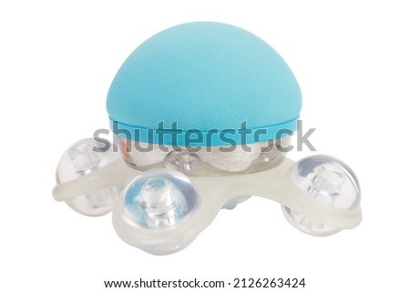Ball massager made of transparent plastic. Isolated over white background. Close-up.