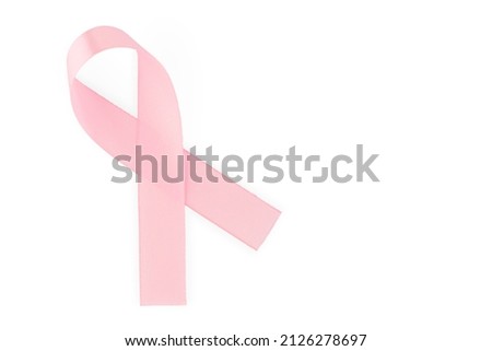 Pink ribbon, symbol of social awareness, isolated on white background, top view. World Cancer Day. copy space. High quality photo