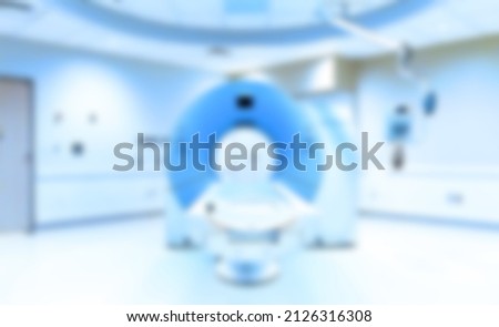Magnetic resonance imaging MRI, medical diagnostic device, x-ray computer, computed tomography CT scan, axial tomography in a modern clinic. Soft toned blurred background. High quality photo