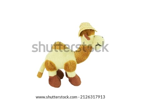 Yellow camel. Plush toy in the shape of vegetable. Isolated on white background without shadow.