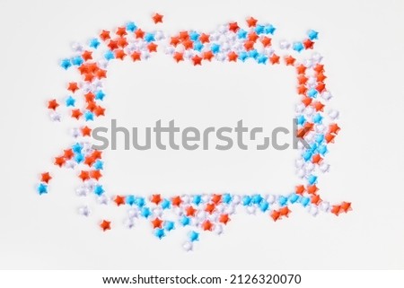 4th of July American Independence Day decorations on white background. flat lay minimalistic compositions, space for text.