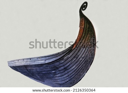 Antique wooden boat of elegant brown shape isolated on a white background Travel landscape sights of Europe.