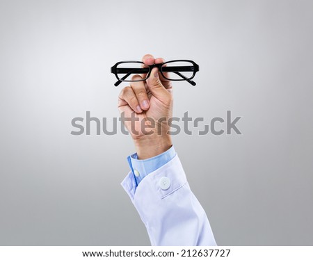 Optician doctor hold with eye glasses