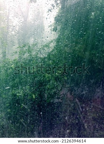 Window with raindrops. Rain outside the window