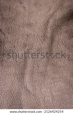 Closeup detail of leather texture background.