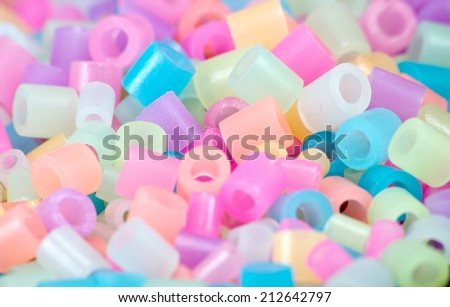 Close Up of pixel beads, plastic granules or plastic beads