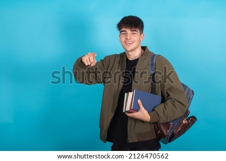 happy isolated student pointing with hand