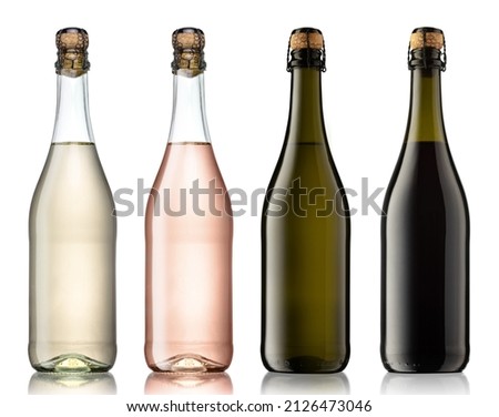 The collection of unlabeled glass bottles of white, rose and red wines, can be used for mockups of product design. Isolated on white. Royalty-Free Stock Photo #2126473046