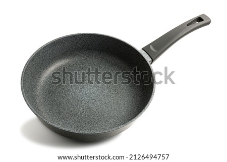 Empty metal frying pan with non-stick coating isolated on white background. Cast iron skillet with handle, grey, marble. Royalty-Free Stock Photo #2126494757