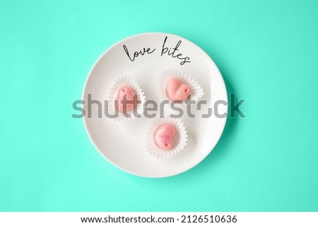 Flatlay of white plate with gentle ruby chocolate