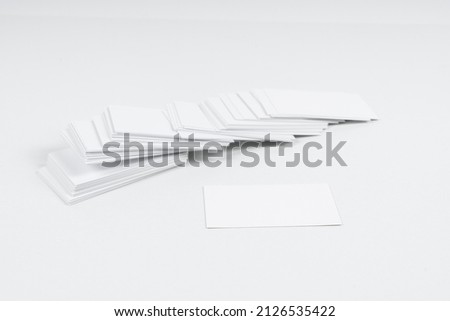 Photo of business cards stack. Template for branding identity. Isolated with clipping path. Mockup   business cards at white  background.