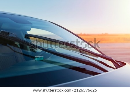 Car windshield brushes. The concept of cleaning products, glass polishing, rain protection. copy space Royalty-Free Stock Photo #2126596625