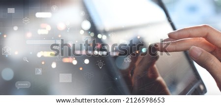 IoT Internet of Things, Social network, digital marketing, business and technology concept. Woman using digital tablet via mobile app with futuristic innovation icon, internet networking, digital tech Royalty-Free Stock Photo #2126598653