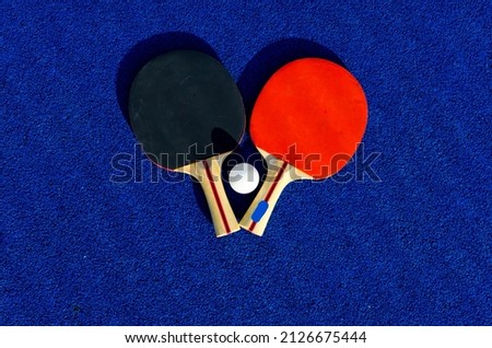 Ping pong table tennis rackets colored. High quality photo