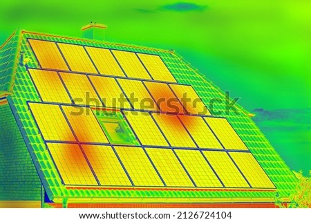 Thermographic inspection of photovoltaic systems by house.Thermovision image of solar panels. Infrared thermovision image. Infrared thermography in inspection of photovoltaic panels.  Royalty-Free Stock Photo #2126724104