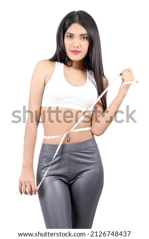 asian woman measuring her waist for healthy on white background

