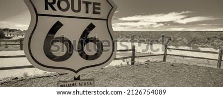U.S. Route 66 signage (US 66 or Route 66), also known as the Will Rogers Highway and colloquially known as the Main Street of America or the Mother Road, Arizona Royalty-Free Stock Photo #2126754089