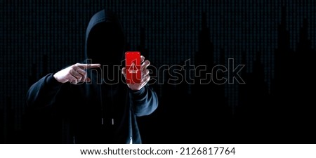 Cyber attack hacker smartphone. Internet web hack technology. Digital mobile phone in hacker man hand isolated on black. Data protection, secured internet access, cybersecurity banner Royalty-Free Stock Photo #2126817764