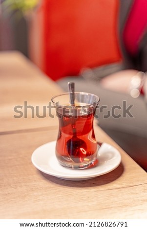 Perfect turkish tea glass with beautiful red tea in the glass
